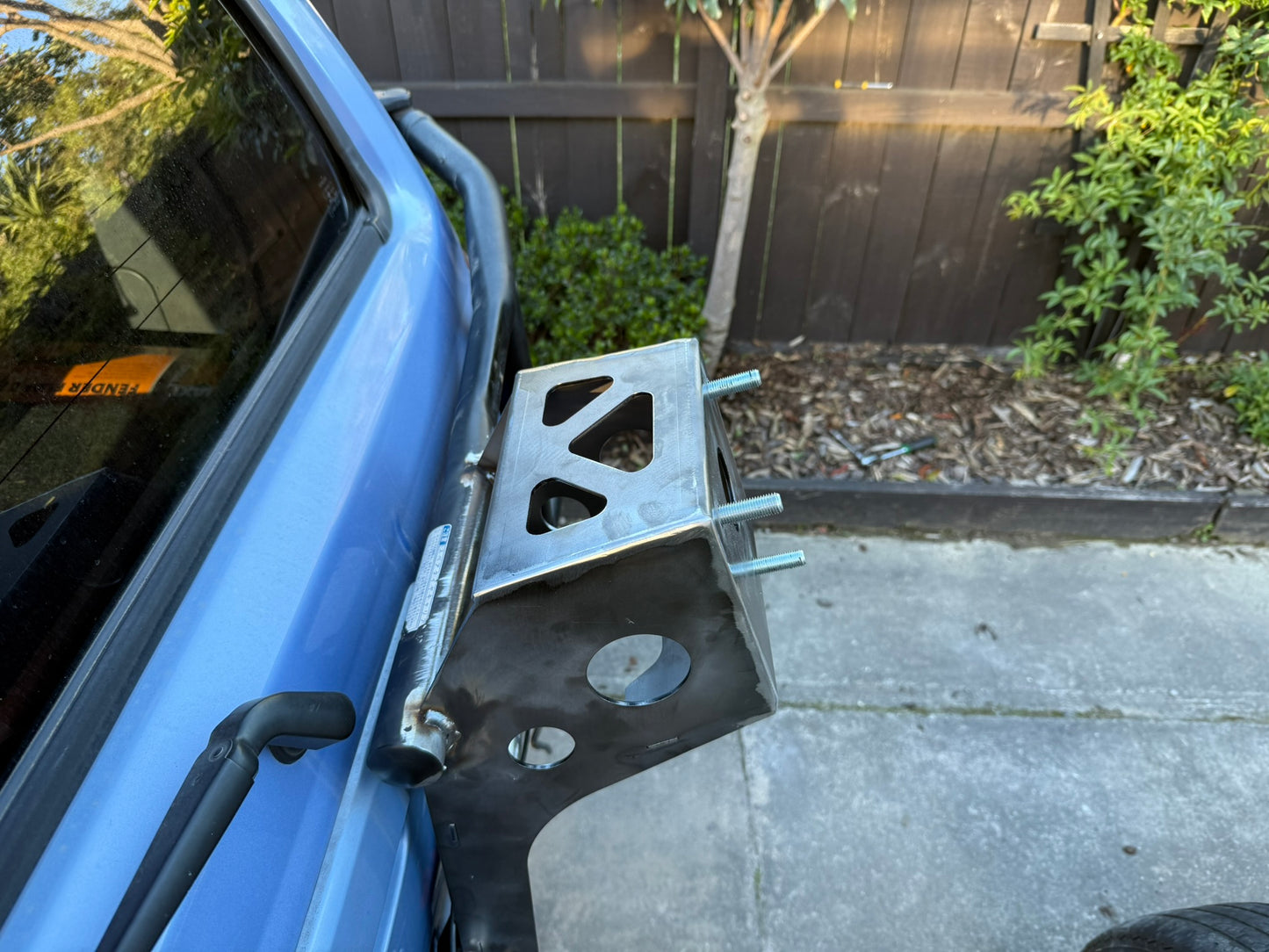 Hilux spare wheel riser mount
